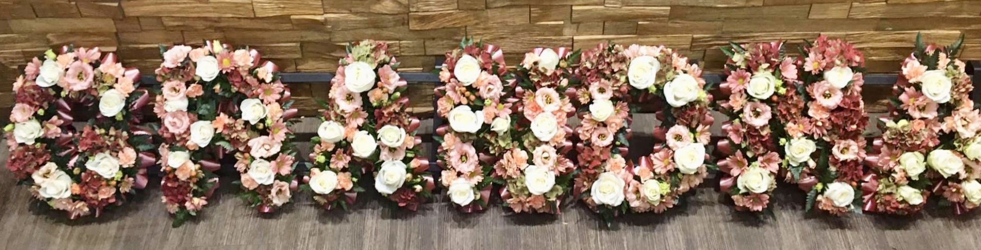 Create any Word or Name, in any colour or flowers, with this open lettering country garden style, funeral tribute. If you have a meaningful colour or a particular flower we can create this tribute using these for you. 24 hours notice needed for Next day delivery or Click and Collect available.