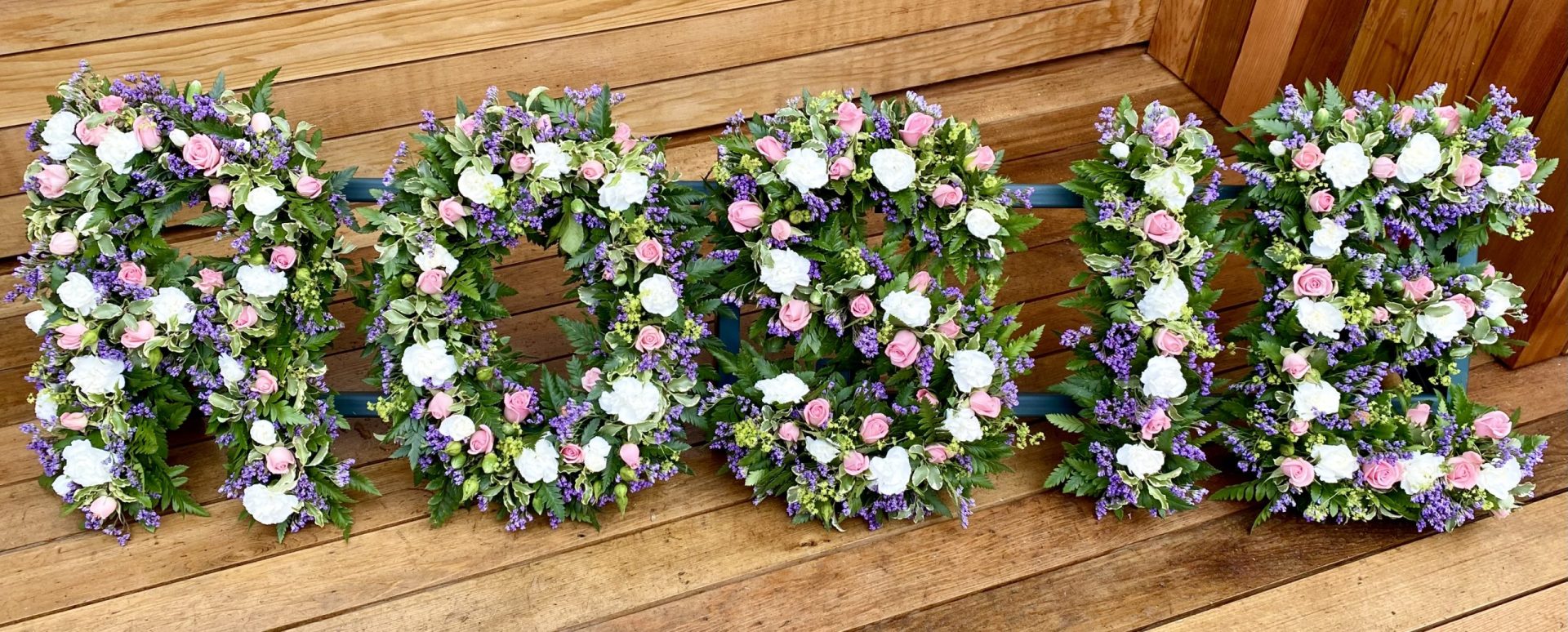 Create any Word or Name, in any colour or flowers, with this open lettering country garden style, funeral tribute. If you have a meaningful colour or a particular flower we can create this tribute using these for you. 24 hours notice needed for Next day delivery or Click and Collect available.