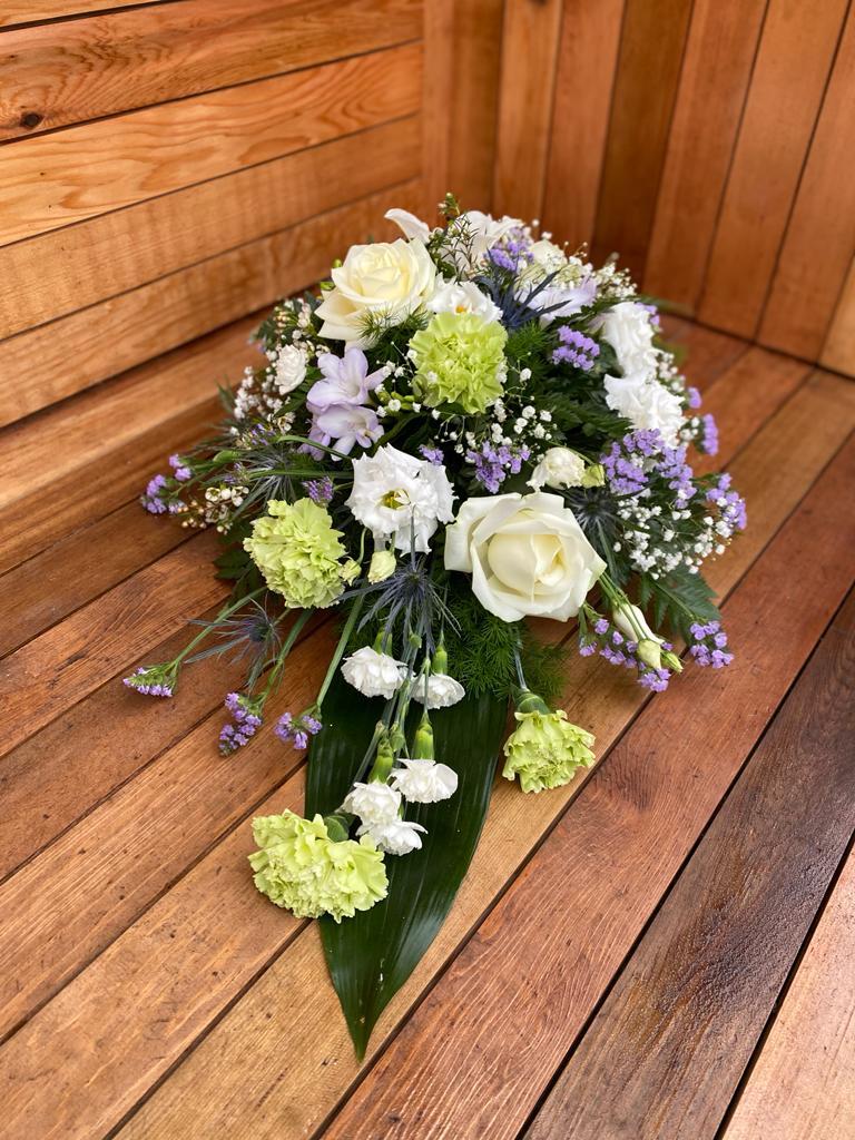 A warm and charming single ended spray in any colour of your choice.Same day delivery.Due to seasonal variations some items may be substituted to produce a display of equal quality and value.Professionally arranged by our expert florists with care.Delivered by hand by our own driver.Click & collect is also available